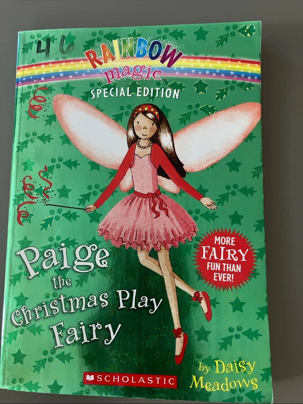 Scholastic Green Book with Pink Fairy Illustration
